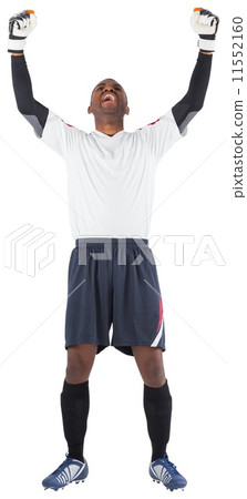 Excited goalkeeper in white cheering Excited goalkeeper in white cheering 11552160
