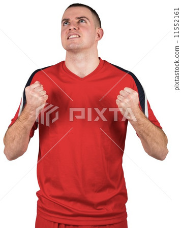 Excited football player cheering Excited football player cheering 11552161