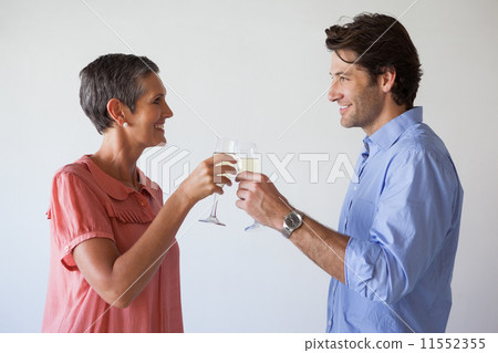 Casual successful business team toasting with champagne 11552355