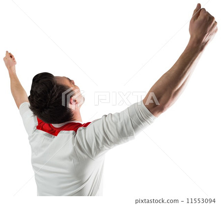 Excited football fan cheering 11553094