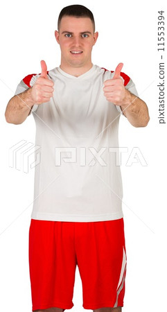 Football player showing thumbs up 11553394