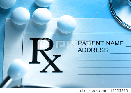 Stethoscope and pills 11555813