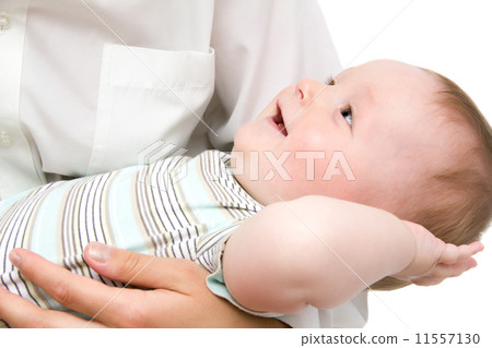 Happy little baby in mother's hands 11557130