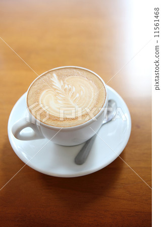 coffee on wood background coffee on wood background 11561468