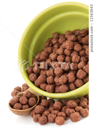 cereal chocolate balls in bowl on white 11563643