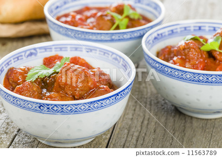 Xiu Mai - Vietnamese spicy pork meatballs in tomato sauce Xiu Mai - Vietnamese spicy pork meatballs in tomato sauce 11563789