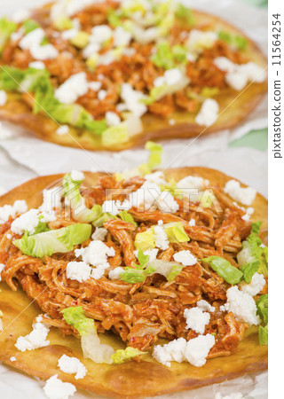 Tostadas - Mexican crispy tortilla with chicken tinga and cotija Tostadas - Mexican crispy tortilla with chicken tinga and cotija 11564254