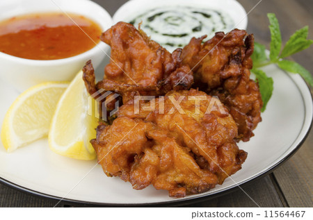 Onion Bhajis, mint raita, chili sauce, lemon & mint leaves  11564467