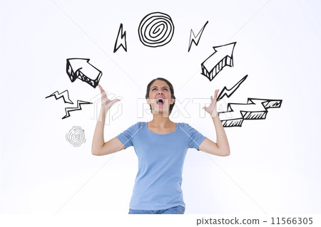 Effort against yellow paper strewn over notepad Effort against yellow paper strewn over notepad 11566305