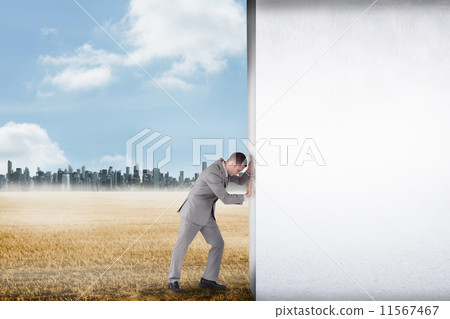 Composite image of hand holding tablet pc 11567467