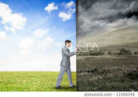 Composite image of hand touching tablet Composite image of hand touching tablet 11568348