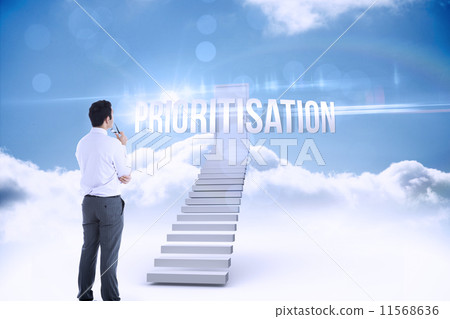 Composite image of businessman drawing light bulb 11568636