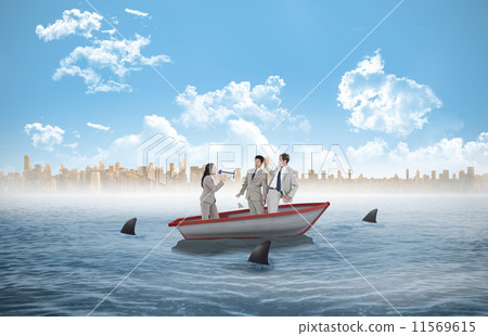 Composite image of businesswoman holding tablet and looking up 11569615