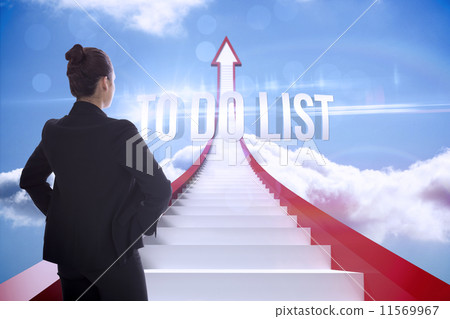 Composite image of annoyed brunette carrying large key Composite image of annoyed brunette carrying large key 11569967