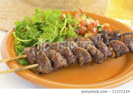 BBQ Chicken Heart - Grilled chicken hearts on skewers with salsa  11572234