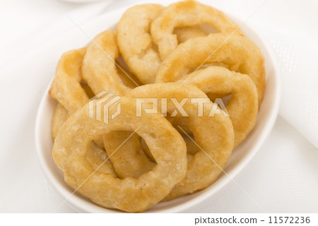 Onion Rings - Battered deep fried onion rings.  11572236