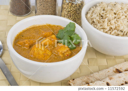 Paneer Makhani - Indian curd cheese curry served with chapatis and rice Paneer Makhani - Indian curd cheese curry served with chapatis and rice 11572592