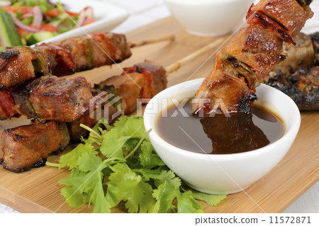Pork kebabs with peppers. Salad, grilled mushroom & BBQ sauce Pork kebabs with peppers. Salad, grilled mushroom & BBQ sauce 11572871