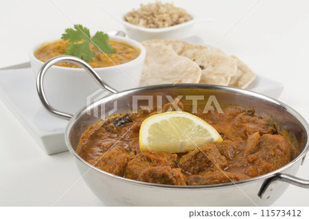 Indian Meat Madras served with pilau rice, tarka dahl & chapatis Indian Meat Madras served with pilau rice, tarka dahl & chapatis 11573412