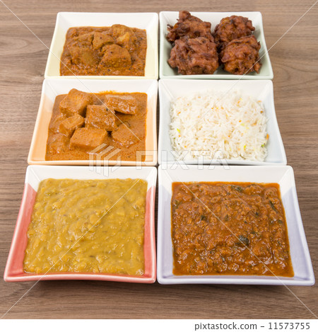 Thali - Indian vegetarian and meat curries, rice and bhajis  11573755