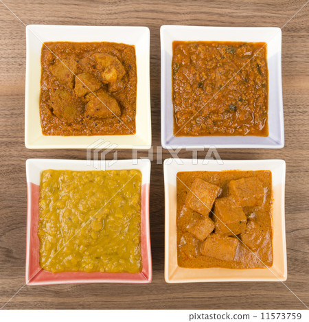 Thali - Indian vegetarian and meat curries, rice and bhajis  11573759