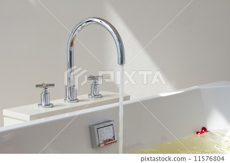 Luxury bath tub and faucet with water Luxury bath tub and faucet with water 11576804