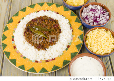 Chili Con Carne with rice, onions, cheese, sour cream & chips Chili Con Carne with rice, onions, cheese, sour cream & chips 11576948
