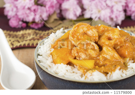 Thai Red Curry with prawns, pumpkin & mango served with rice Thai Red Curry with prawns, pumpkin & mango served with rice 11579800