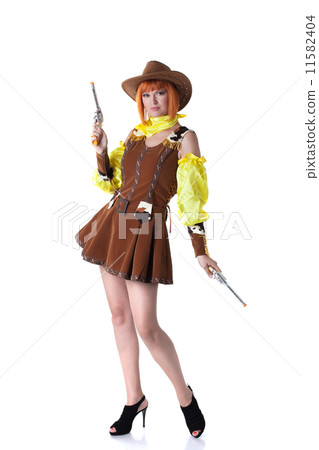 Attractive woman posing in cowboy costume Attractive woman posing in cowboy costume 11582404
