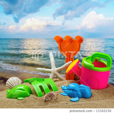colorful toys for childrens sandboxes against the sea colorful toys for childrens sandboxes against the sea 11583230