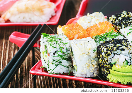 rolls and sushi and chopstick rolls and sushi and chopstick 11583236