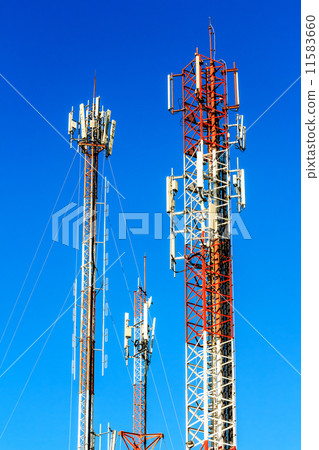 Telecommunication tower against blue sky background Telecommunication tower against blue sky background 11583660