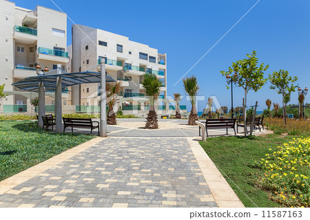 Modern buildings and small square in Ashqelon, Israel. 11587163
