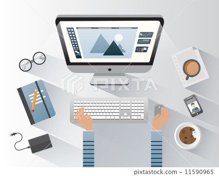 Designer working on computer at desk Designer working on computer at desk 11590965