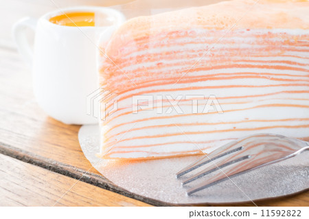 Close up crepe cake with orange sauce Close up crepe cake with orange sauce 11592822