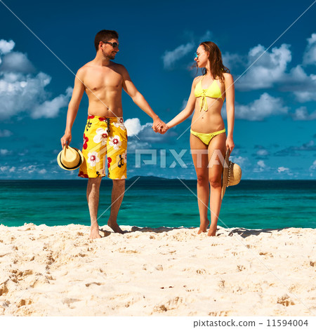 Couple on a beach at Seychelles 11594004