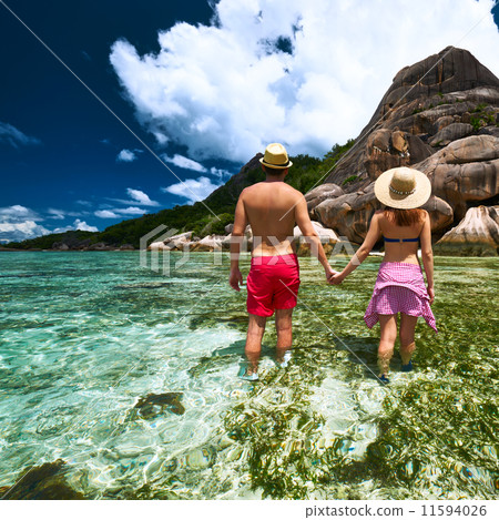 Couple on a beach at Seychelles 11594026