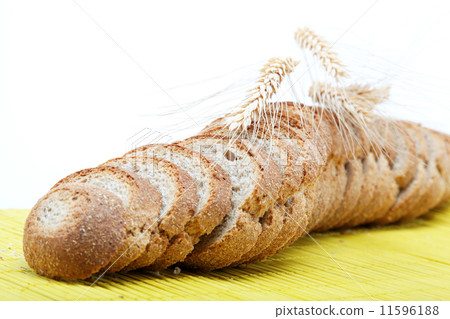 Fresh bread on a bamboo napkin. Fresh bread on a bamboo napkin. 11596188