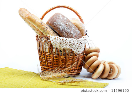 Fresh bread in the basket fully isolated. Fresh bread in the basket fully isolated. 11596190