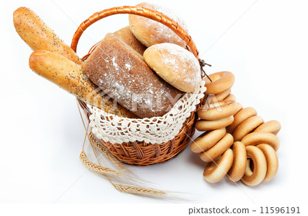 Fresh bread in the basket fully isolated. Fresh bread in the basket fully isolated. 11596191