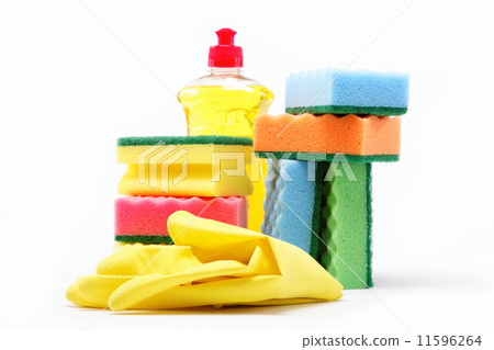 Detergent bottle, rubber gloves and cleaning sponge on a white b 11596264