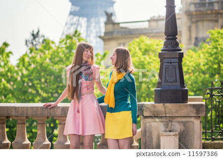 Girls in Paris near the Eiffel tower 11597386