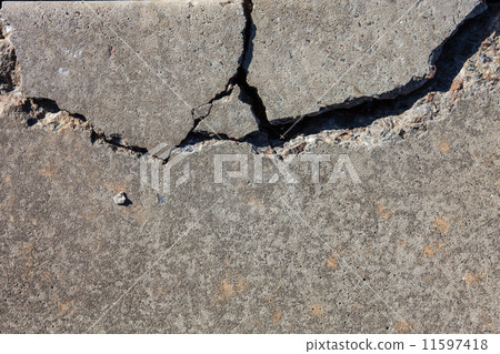 Cracked concrete surface 11597418