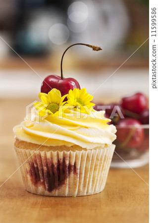 Cupcake with Cherries and Flower Cupcake with Cherries and Flower 11599586