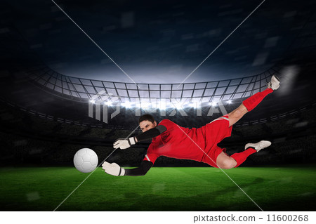 图库照片 composite image of fit goal keeper jumping up