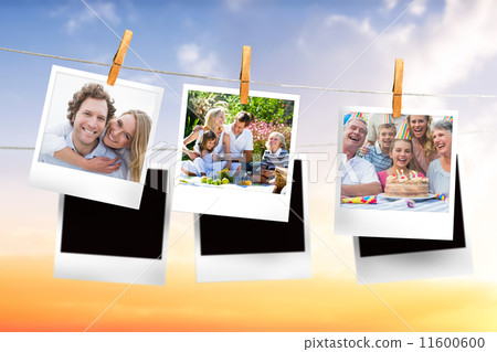 Composite image of instant photos hanging on a line 11600600
