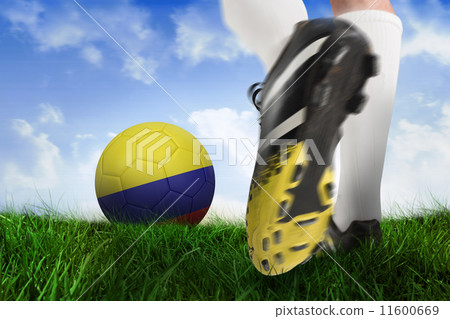 Composite image of football boot kicking colombia ball Composite image of football boot kicking colombia ball 11600669