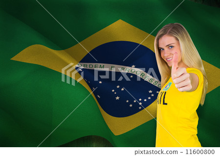 Composite image of pretty football fan in brasil tshirt Composite image of pretty football fan in brasil tshirt 11600800