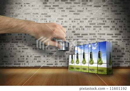 Composite image of hand building wall 11601192