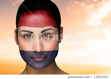 Composite image of beautiful brunette in netherlands facepaint Composite image of beautiful brunette in netherlands facepaint 11601481